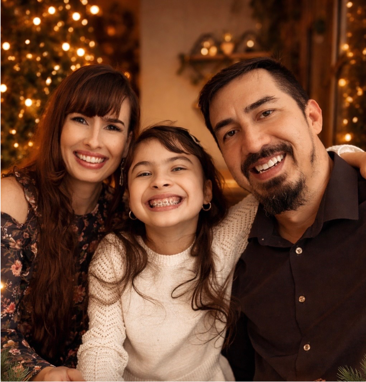 Nolan Martinez with his wife and daughter